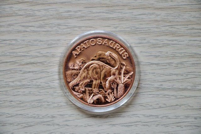copper round oz .999 con raffigurazione di un Apatosauro